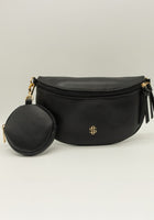 Made of PU leather, it features a detachable strap, detachable coin pouch, secure top zip closure, and an additional back zippered pocket. The spacious lined interior includes an extra zippered pocket for easy organization. Finished with the signature Simply Southern logo for a chic touch. 💕