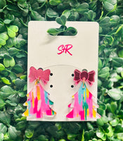 Add a playful pop to your holiday style with these Multicolored Acrylic Tree Dangle Earrings! Bursting with bright color and topped with a shiny pink mirrored bow, they’re the perfect choice for a funky and fun Christmas look. Lightweight, hypoallergenic, and nickel-free—so you can celebrate in comfort and style.