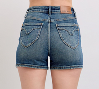 Discover the perfect combination of comfort and style with our High-Rise Shield Back Pocket Shorts. Made with a blend of 94% cotton, 5% polyester, and 1% spandex, these shorts offer a soft and stretchy fit that moves with you. With an 11" rise and 4" inseam, they provide the perfect amount of coverage for any activity. Whether you're running errands or hitting the gym, these shorts are sure to become your go-to choice!