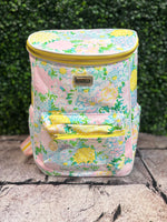 Insulated cooler tote in Lilly Garden Home print with adjustable straps and front zipper pocket, perfect for carrying snacks, drinks, and sunscreen outdoors.