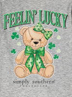 Lucky Teddy Tee
Simply Southern 
Feelin Lucky Tee
Features a Brown teddy bear with green bows. 
Printed on a grey tee