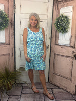 Feminine, flattering, and sun-safe! This best-selling sleeveless dress features charming ruffles on the front and back, a scoop neckline, and a straight hemline. Crafted from a soft 92% Nylon / 8% Spandex blend, it offers a comfortable, stretchy fit that flatters all shapes and sizes. With UPF50 sun protection and a 30.5" length, it’s perfect for sunny days, travel, or everyday wear. Pre-shrunk for a lasting fit—just machine wash and hang dry for easy care!