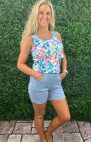 The Lulu-B Denim Pull-On Shorts are a warm-weather essential designed for comfort, ease, and polished style. Made from Lulu-B’s signature denim fabric, these shorts offer a smooth, structured feel with comfortable stretch. The pull-on waistband creates an easy, flattering fit, while subtle side vents add movement and a modern touch. Lightweight and travel-friendly, these shorts are perfect for everyday wear, vacations, and sunny days on the go.