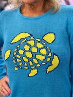 Stay cozy and stylish in this crewneck sweater crafted from a soft 55% acrylic and 45% cotton blend. Features a classic fit and a 25.5" center back length. Easy care — just machine wash cold and line dry.