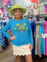 Stay cozy and stylish in this crewneck sweater crafted from a soft 55% acrylic and 45% cotton blend. Features a classic fit and a 25.5" center back length. Easy care — just machine wash cold and line dry.