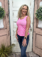 Classic sleeveless tank with a 24" back length. Stretchy, pre-shrunk, and easy to care for—perfect for layering or wearing solo in warm weather.
Features a Green/White/Pink Geometric Pattern