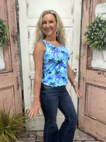 Classic sleeveless tank with a 24" back length. Stretchy, pre-shrunk, and easy to care for—perfect for layering or wearing solo in warm weather.
Features a Blue/Navy/Teal/White Palm Tree Pattern