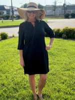 Introducing the Lulu-B Travel Dress! This dress is perfect for all your adventures with its SPF 50 fabric and quarter sleeves for sun protection. Pair it with the v-neck and side slits for a stylish and comfortable outfit. Get ready to travel in style and safety!
