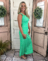 Sexy maxi dress with straight fit, cutout back detail, and UPF50 sun protection fabric for stylish summer wear.