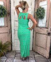 Sexy maxi dress with straight fit, cutout back detail, and UPF50 sun protection fabric for stylish summer wear.