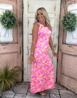 Sexy maxi dress with straight fit, cutout back detail, and UPF50 sun protection fabric for stylish summer wear.