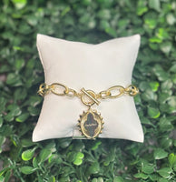 For the mom who deserves to be celebrated every single day — and the woman who knows a great piece when she sees one. The Mama Gold Link and Chain Bracelet is a sentimental style she'll actually wear, featuring a coin engraved with beautiful script and a silhouette inspired by our beloved Abbie shape. Toggle it on in the morning and let it do the rest.