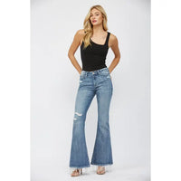 Mica Denim mid rise super flare jeans with wide leg silhouette, women’s stylish flare denim inspired by California style. Mica Denim jeans, mid rise flare jeans, super flare denim, women’s flare jeans, California style denim, boutique flare jeans, Sweet Southern Charm denim