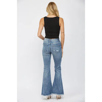 Mica Denim mid rise super flare jeans with wide leg silhouette, women’s stylish flare denim inspired by California style. Mica Denim jeans, mid rise flare jeans, super flare denim, women’s flare jeans, California style denim, boutique flare jeans, Sweet Southern Charm denim