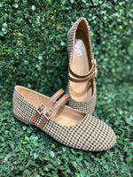 Featuring two sleek buckled straps across the foot, these stylish flats offer a secure fit and a touch of edge. The soft faux leather upper and lightly cushioned insole keep your feet comfy all day