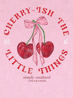 simply southern tee
cherry-ish the little things 
features cherries with a bow 
printed on a washed pink tee