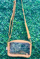 Simply Southern Stadium Crossbody - Coco
The Simply Southern Stadium Crossbody is perfect for game day, concerts, or nights out. Clear PU body, gold hardware, zip closure, and detachable strap.