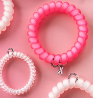 Meet your new year-round hair essential! The Large TELETIES Hair Coils deliver a strong grip without damage, keeping your style secure all day long. When not in your hair, they double as a chic wrist accessory—functional and fashionable in one.