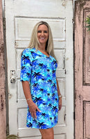 Stay stylish and sun-protected in the Lulu-B V-Neck Elbow Sleeve Dress! Lightweight, pre-shrunk fabric with UPF50+ protection—perfect for any occasion.