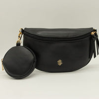 Made of PU leather, it features a detachable strap, detachable coin pouch, secure top zip closure, and an additional back zippered pocket. The spacious lined interior includes an extra zippered pocket for easy organization. Finished with the signature Simply Southern logo for a chic touch. 💕