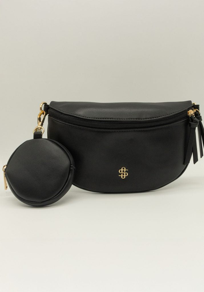 Made of PU leather, it features a detachable strap, detachable coin pouch, secure top zip closure, and an additional back zippered pocket. The spacious lined interior includes an extra zippered pocket for easy organization. Finished with the signature Simply Southern logo for a chic touch. 💕