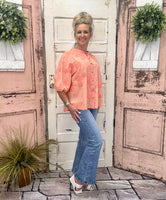 Coral Textured Top With Floral Detail
