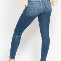 High-Rise Button Fly Skinny Jeans