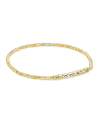 Style | Addison stretch bracelet with subtle sparkle
Metal | 14k yellow gold over brass
Circumference | 6.5 inches unstretched
Stations | 1 inch long x 0.11 inches wide
Design | Slip-on stretch construction
Brand | Kendra Scott