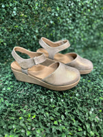 wedge in shimmering rose gold metallic. Featuring lightweight EVA cushioning and a secure Velcro ankle strap, these stylish wedges absorb impact for effortless wear
