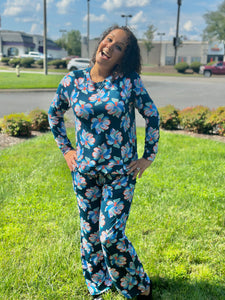 Slip into comfort with our Annie Pajamas, the perfect blend of cozy and cute. This two-piece set features a long sleeve scoop neck&nbsp;top and long pants with a 27” inseam. Designed with an elastic waistband, adjustable drawstring, and side pockets, these pajamas are made from a soft, stretchy blend of 94% polyester and 6% spandex—giving you that just-right feel for lounging or bedtime.