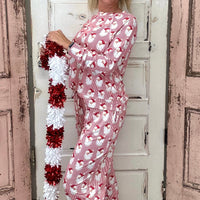 Slip into comfort with our Annie Pajamas, the perfect blend of cozy and cute. This two-piece set features a long sleeve scoop neck&nbsp;top and long pants with a 27” inseam. Designed with an elastic waistband, adjustable drawstring, and side pockets, these pajamas are made from a soft, stretchy blend of 94% polyester and 6% spandex—giving you that just-right feel for lounging or bedtime.