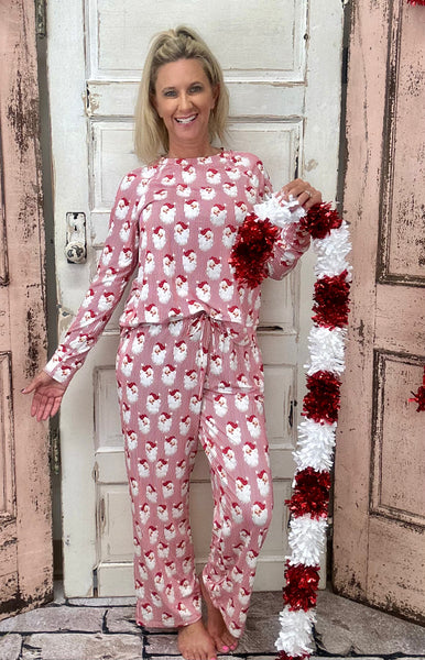 Slip into comfort with our Annie Pajamas, the perfect blend of cozy and cute. This two-piece set features a long sleeve scoop neck top and long pants with a 27” inseam. Designed with an elastic waistband, adjustable drawstring, and side pockets, these pajamas are made from a soft, stretchy blend of 94% polyester and 6% spandex—giving you that just-right feel for lounging or bedtime.