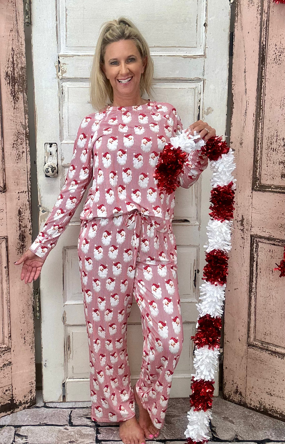 Slip into comfort with our Annie Pajamas, the perfect blend of cozy and cute. This two-piece set features a long sleeve scoop neck top and long pants with a 27” inseam. Designed with an elastic waistband, adjustable drawstring, and side pockets, these pajamas are made from a soft, stretchy blend of 94% polyester and 6% spandex—giving you that just-right feel for lounging or bedtime.