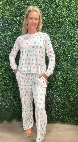 Slip into comfort with our Annie Pajamas, the perfect blend of cozy and cute. This two-piece set features a long sleeve scoop neck top and long pants with a 27” inseam. Designed with an elastic waistband, adjustable drawstring, and side pockets, these pajamas are made from a soft, stretchy blend of 94% polyester and 6% spandex—giving you that just-right feel for lounging or bedtime.