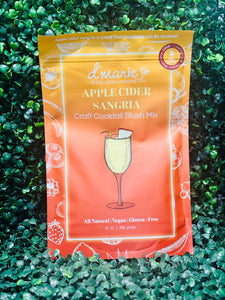 Fall apple cider sangria with white wine, apple cider, and water served over ice in a glass pitcher