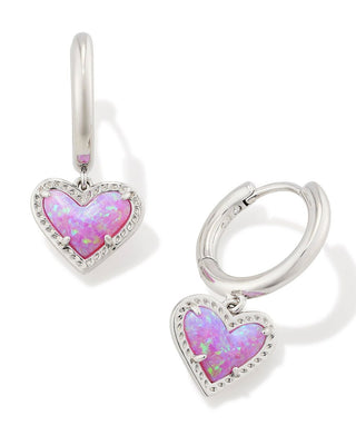 Brand | Kendra Scott
Style | Huggie earrings with asymmetrical heart charms
Material | Bubblegum Pink Kyocera Opal
Finish | Rhodium
Hoop Size | 0.6-inch outside diameter
Charm Size | 0.33 inches long x 0.28 inches wide