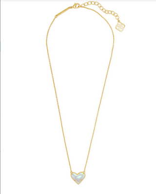 Brand | Kendra Scott
Style | Ari Heart short pendant necklace with an asymmetrical heart design
Material | Dichroic Glass
Finish | Gold tone
Chain Length | 15 inches with a 2-inch extender
Pendant Size | 0.49 inches long x 0.57 inches wide
