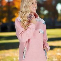 Stay warm in the Simply Southern Aria Quarter Zip. Features 1/4 zip, pockets, chest pocket & logo detail. Soft polyester-rayon blend.