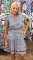 This charming 100% cotton dress features classic navy pinstripes, flutter sleeves, and a flattering tiered silhouette. The elastic waistband adds all-day comfort while the colorful embroidered hem brings a fun, feminine touch. Lightweight and breathable—perfect for warm-weather outings, vacations, or casual days out.
