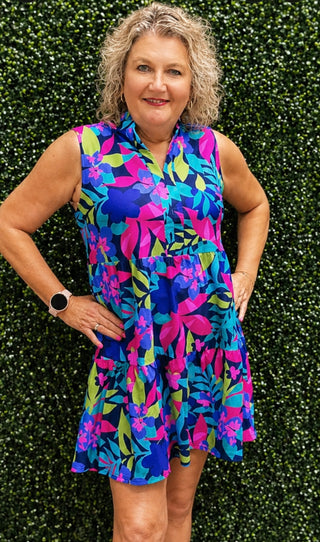 Multi colored tropical tiered dress with collar and sleeveless.