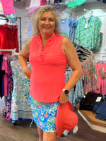 Aryeh Top and Skort
Bright Salmon Tank Top with ruffle vneckline paired with our aryeh bodycon skort. 
