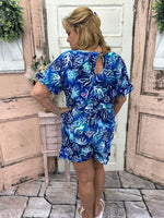 This chic shorts romper features a scoop neck with ruffle details on the hem and cuffs. Flattering, comfy, and a gorgeous shade of blue with UPF50 protection.
