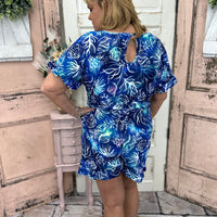 This chic shorts romper features a scoop neck with ruffle details on the hem and cuffs. Flattering, comfy, and a gorgeous shade of blue with UPF50 protection.