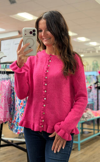 Brand | Aryeh
Color | Hot Pink
Closure | Full button-down front
Ruffle Detail | Center placket ruffle running the length of the button line; ruffle trim at sleeve hems and bottom hem
Fabric | Soft knit construction
Fit | Relaxed, easy-wearing silhouette
