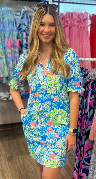 Feminine details meet warm-weather practicality in the Sienna Ruffle Sleeve Dress. The Blue Lagoon Blossoms print is fresh and vacation-ready, while the ruffle sleeve detail adds a soft, romantic touch to an otherwise effortless silhouette. Cooling UPF50+ fabric keeps you comfortable in the sun, and the lightweight, wrinkle-resistant construction means it looks just as good on day three of your trip as it did on day one.