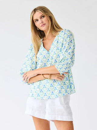 The Ashlyn Top is an easy staple with thoughtful detail. Featuring a flattering V-neckline, smocked cuff sleeves, and a straight fit, it’s comfortable and effortless. Pair it with your favorite jeans or shorts for a go-to look you’ll reach for again and again.