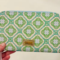 Lilly Pulitzer zipper wallet, Bamboo Logo Trellis wallet, travel organizer wallet, passport wallet, Lilly Pulitzer travel accessories, zipper wallet with pockets, stylish travel wallet. Lilly Pulitzer Bamboo Logo Trellis zipper wallet with gold logo plaque and bamboo zipper pull, designed for travel essentials