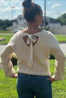 Chic, cozy, and on-trend — this Bow Sweater is a must-have for the season! Featuring adorable bow accents, this stylish piece easily transitions from casual to dressy. Whether you're pairing it with your favorite jeans for a laid-back look or dressing it up with tailored pants and boots, this sweater adds a feminine touch to any outfit. Soft, comfortable, and effortlessly cute — it’s sure to become a go-to in your wardrobe.
