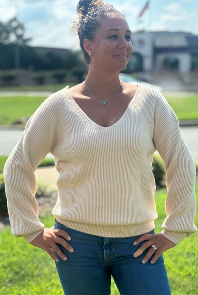 Chic, cozy, and on-trend — this Bow Sweater is a must-have for the season! Featuring adorable bow accents, this stylish piece easily transitions from casual to dressy. Whether you're pairing it with your favorite jeans for a laid-back look or dressing it up with tailored pants and boots, this sweater adds a feminine touch to any outfit. Soft, comfortable, and effortlessly cute — it’s sure to become a go-to in your wardrobe.