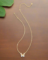 Bianca Butterfly Gold Iridescent White Mix Pendant Necklace
Kendra Scott 
